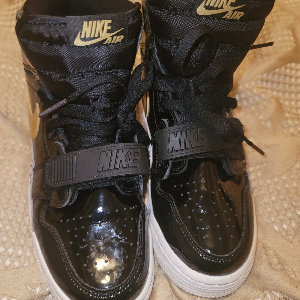Nike Kids Glossy Black and Gold Sneakers
